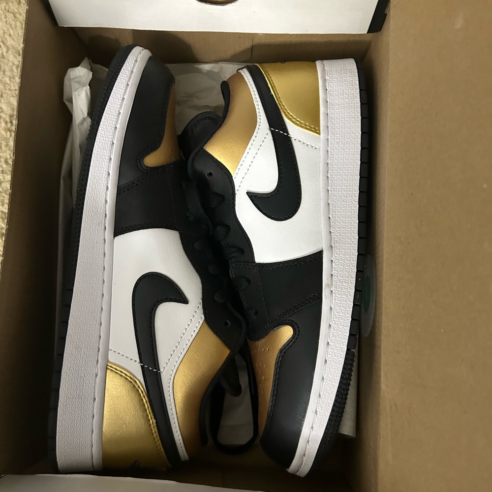 Gold low top Jordan’s